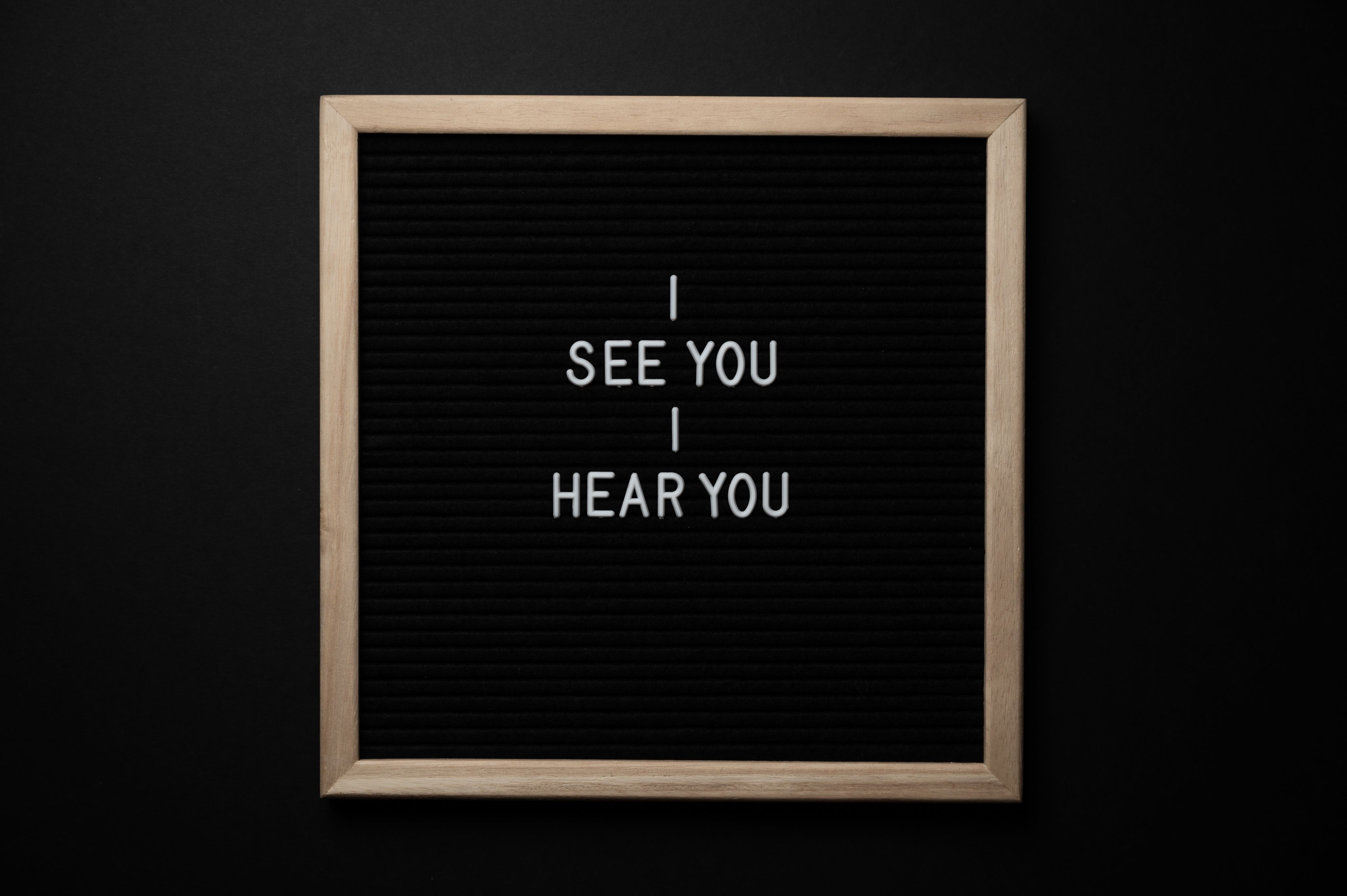 Blackboard saying 'I see you, I hear you'