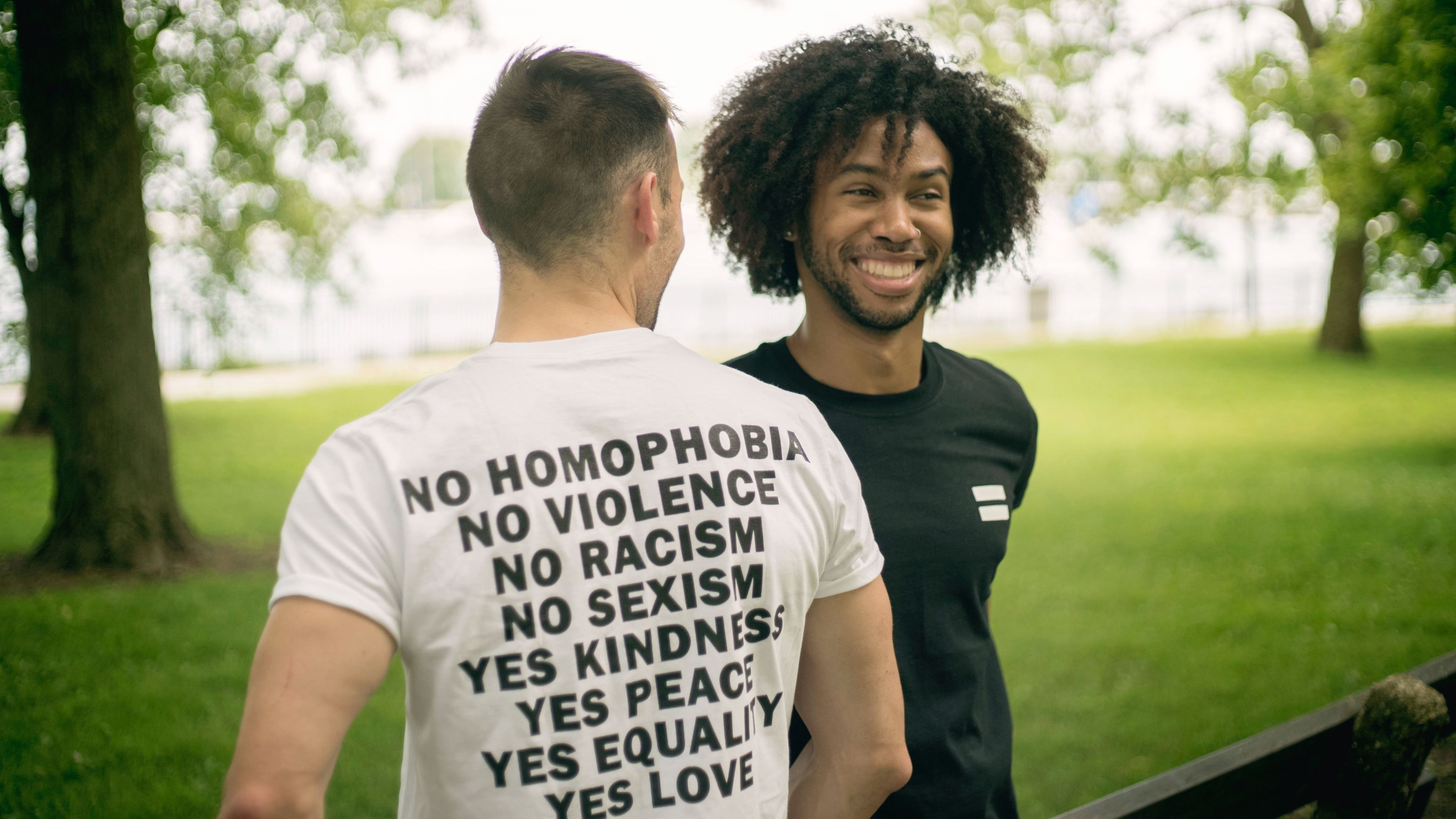 Men wearing t-shirts that support equality